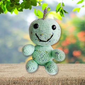Dinosaurio tejido en crochet. Muñecos tejdos personalizados. Talykí Taller de Tejidos y diseño textil